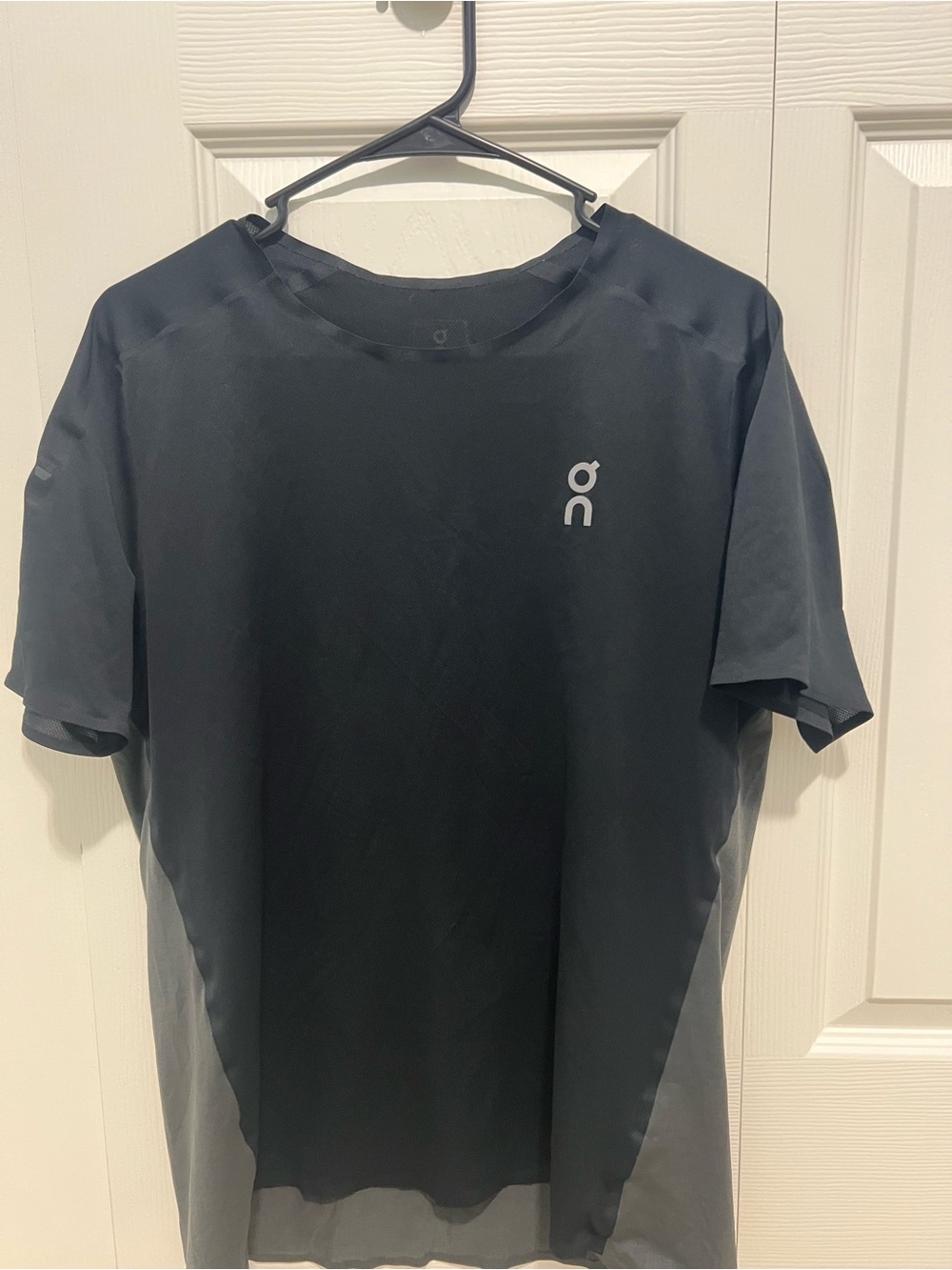 On Running Men’s Black Short Sleeve Performance Tee